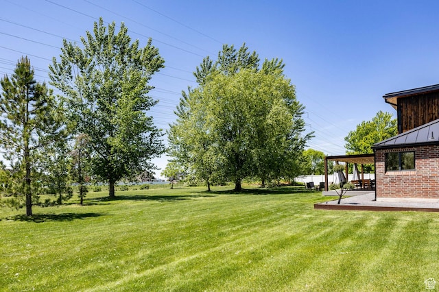 1983 W Ranch Rd, Farmington, UT 84025 - view of green lawn featuring a patio area