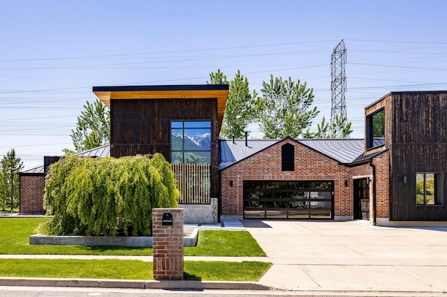 1983 W Ranch Rd, Farmington, UT 84025 - contemporary home with a standing seam roof, metal roof, and driveway