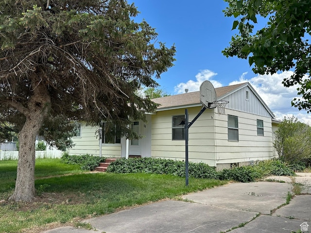 50 N 100 E, Meadow, UT 84644 - view of side of property featuring a yard and board and batten siding