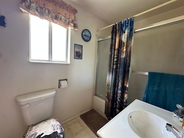 50 N 100 E, Meadow, UT 84644 - full bath featuring a sink, bath / shower combo with glass door, toilet, and tile patterned floors