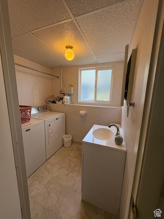 9835 S 610 E, Sandy, UT 84070 - laundry room featuring washer and clothes dryer and wooden walls