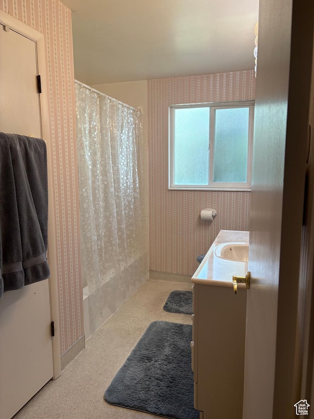 9835 S 610 E, Sandy, UT 84070 - bathroom featuring wallpapered walls and vanity