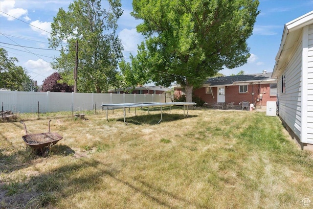 175 Green Dr, Layton, UT 84041 - view of yard featuring a trampoline