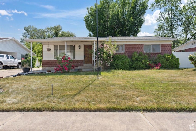 175 Green Dr, Layton, UT 84041 - ranch-style house featuring brick siding and a front yard