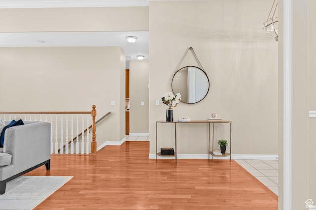 11815 S Cottage Side Way E, Draper, UT 84020 - hall featuring light wood-type flooring, baseboards, and an upstairs landing