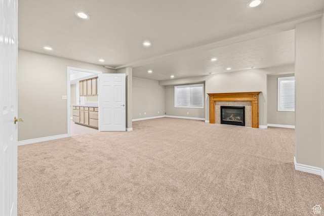 11815 S Cottage Side Way E, Draper, UT 84020 - unfurnished living room featuring carpet floors, recessed lighting, baseboards, a fireplace, and healthy amount of natural light