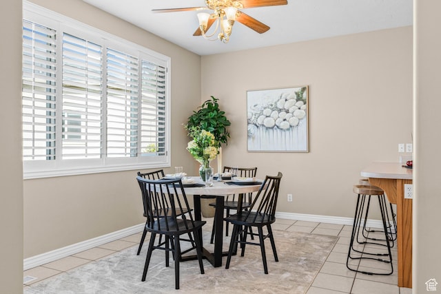 11815 S Cottage Side Way E, Draper, UT 84020 - tiled dining space with ceiling fan and baseboards