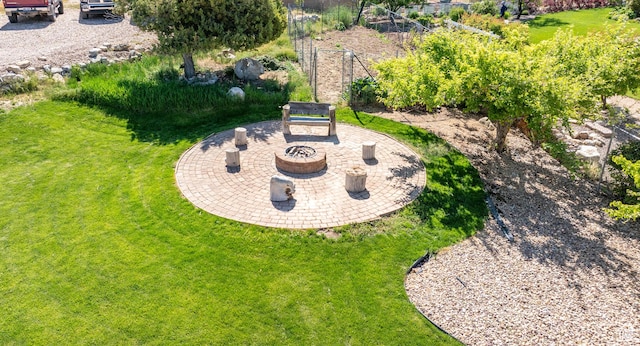 935 S 950 E, Ephraim, UT 84627 - view of grassy yard featuring a fire pit and a patio area