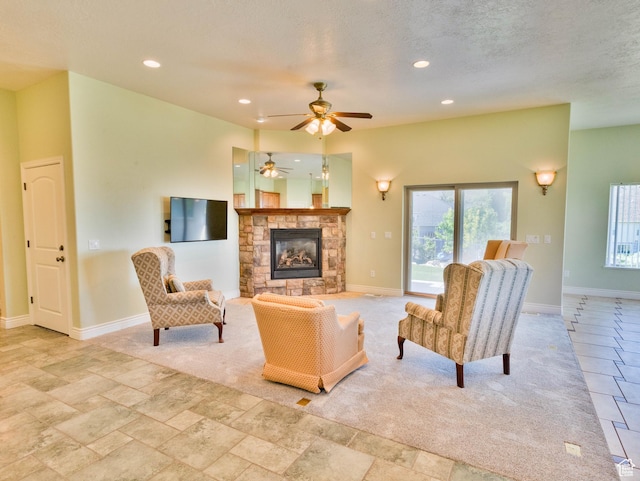 935 S 950 E, Ephraim, UT 84627 - living area featuring plenty of natural light, baseboards, a fireplace, recessed lighting, and a textured ceiling
