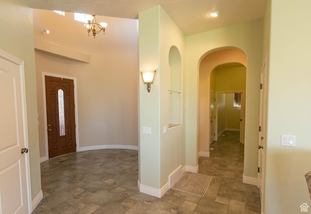 935 S 950 E, Ephraim, UT 84627 - entryway with arched walkways, stone finish flooring, and a chandelier