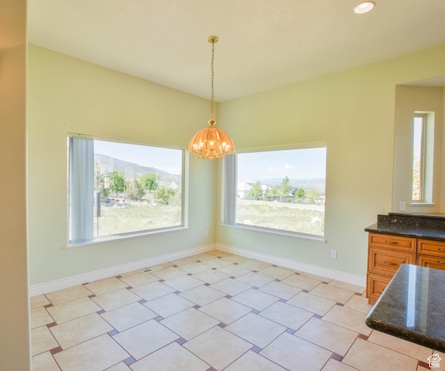 935 S 950 E, Ephraim, UT 84627 - unfurnished dining area featuring a chandelier, baseboards, and recessed lighting