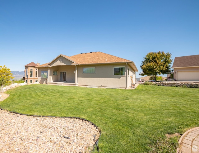 935 S 950 E, Ephraim, UT 84627 - rear view of property featuring stucco siding and a yard