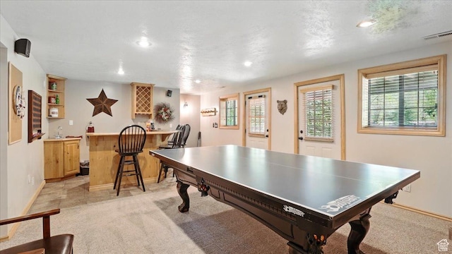 3786 Beaver Creek Rd, Kamas, UT 84036 - game room with a bar, recessed lighting, light carpet, and baseboards