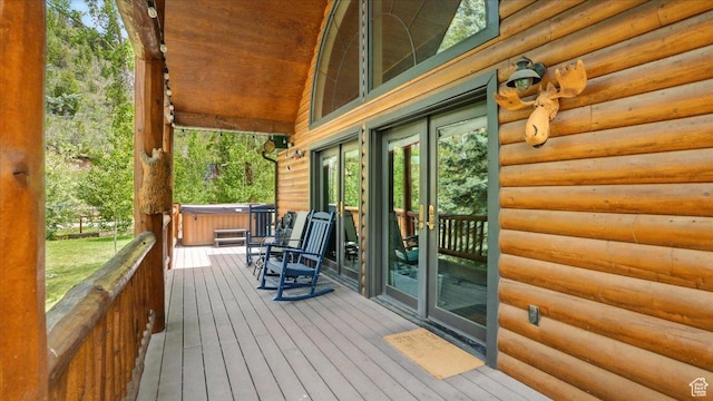 3786 Beaver Creek Rd, Kamas, UT 84036 - deck featuring french doors and a hot tub