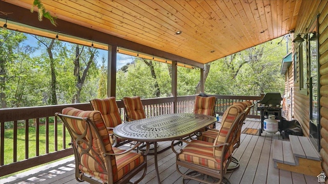 3786 Beaver Creek Rd, Kamas, UT 84036 - wooden terrace featuring outdoor dining area, view of scattered trees, and area for grilling
