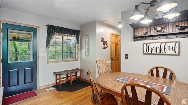 3786 Beaver Creek Rd, Kamas, UT 84036 - dining space with light wood-type flooring and baseboards