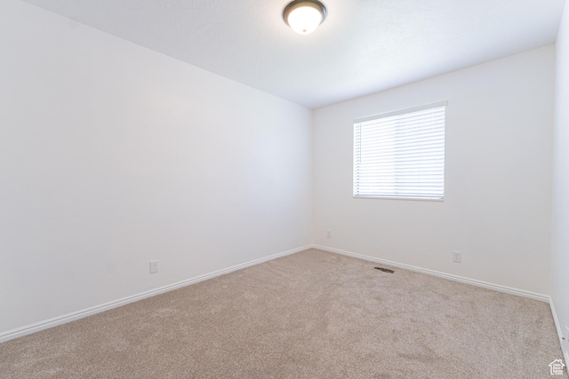 1560 W 300 S # 1, Vernal, UT 84078 - empty room featuring carpet floors and baseboards