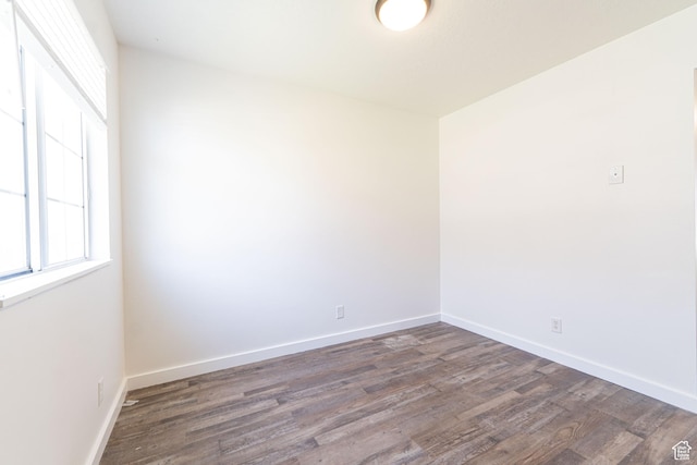 1560 W 300 S # 1, Vernal, UT 84078 - unfurnished room featuring healthy amount of natural light, wood finished floors, and baseboards