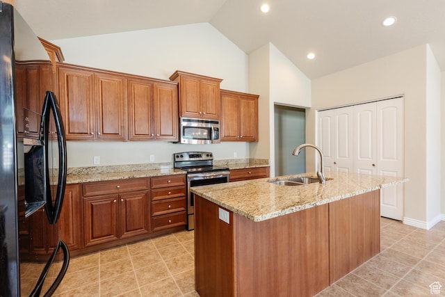 344 E 2280 N Unit C, North Logan, UT 84341 - kitchen with appliances with stainless steel finishes, a sink, high vaulted ceiling, brown cabinetry, and light stone counters