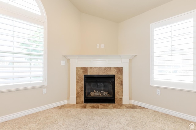 344 E 2280 N Unit C, North Logan, UT 84341 - detailed view of carpet flooring, a fireplace, and baseboards