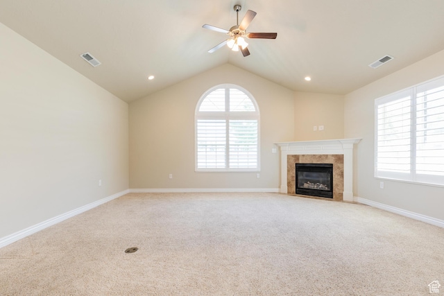 344 E 2280 N Unit C, North Logan, UT 84341 - unfurnished living room featuring light colored carpet, a ceiling fan, a premium fireplace, vaulted ceiling, and baseboards
