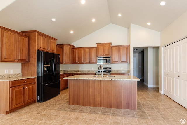 344 E 2280 N Unit C, North Logan, UT 84341 - kitchen featuring stainless steel appliances, a sink, high vaulted ceiling, a kitchen island with sink, and brown cabinetry