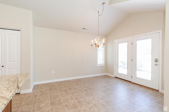 344 E 2280 N Unit C, North Logan, UT 84341 - unfurnished dining area featuring a chandelier, vaulted ceiling, and baseboards