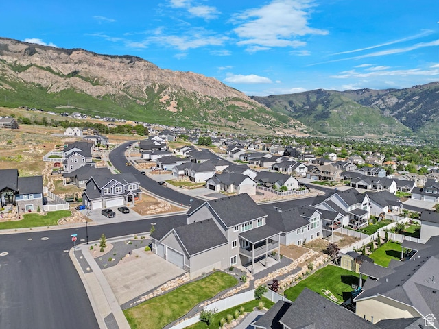 3877 N 425 E, North Ogden, UT 84414 - aerial overview of property's location featuring nearby suburban area and a mountain backdrop