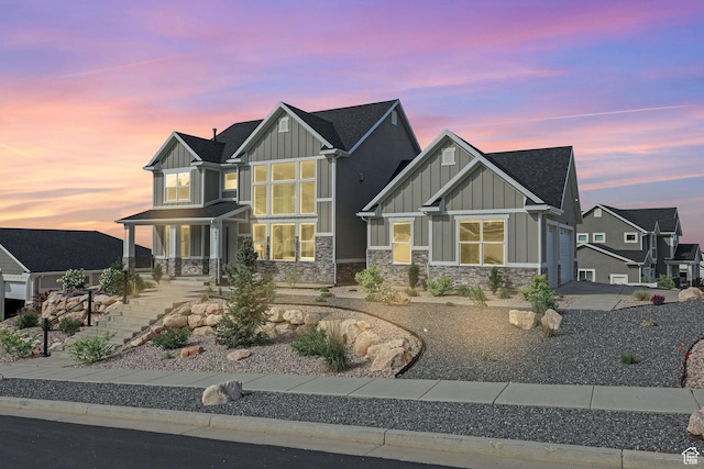 3877 N 425 E, North Ogden, UT 84414 - craftsman-style home featuring board and batten siding, stone siding, and an attached garage