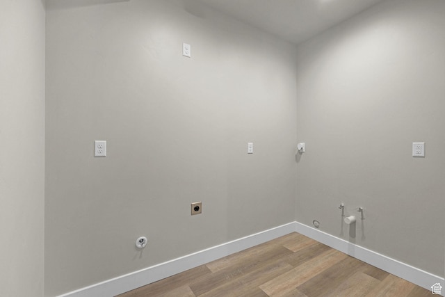 3877 N 425 E, North Ogden, UT 84414 - washroom with hookup for a gas dryer, hookup for an electric dryer, baseboards, light wood finished floors, and washer hookup