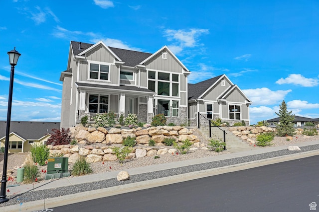 3877 N 425 E, North Ogden, UT 84414 - craftsman-style house featuring board and batten siding and stone siding