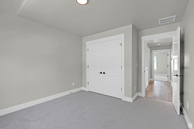 3877 N 425 E, North Ogden, UT 84414 - unfurnished bedroom featuring carpet flooring, baseboards, and a closet