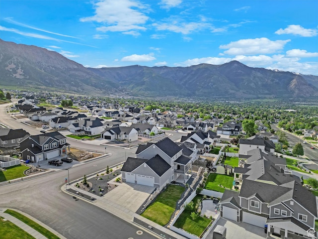 3877 N 425 E, North Ogden, UT 84414 - aerial view of residential area featuring a mountain backdrop