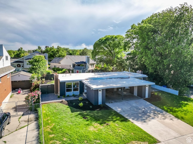 1210 E Bonner Way S, Millcreek, UT 84117 - view of front of home with concrete driveway, a gate, a chimney, a residential view, and an attached carport