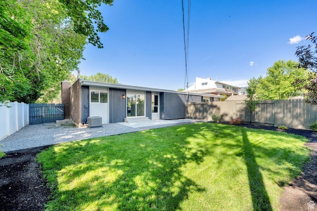 1210 E Bonner Way S, Millcreek, UT 84117 - back of house with a patio and central AC