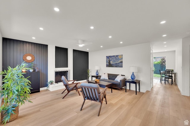 1210 E Bonner Way S, Millcreek, UT 84117 - living area featuring light wood-style flooring, recessed lighting, a fireplace, and baseboards