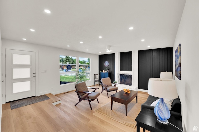 1210 E Bonner Way S, Millcreek, UT 84117 - living room featuring recessed lighting, light wood-type flooring, a fireplace, and baseboards