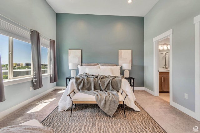 4237 S Birkhill Blvd, Murray, UT 84107 - bedroom with light carpet, baseboards, and ensuite bathroom