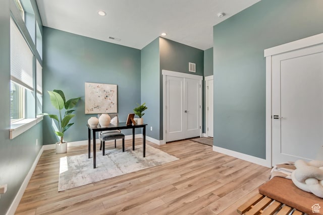 4237 S Birkhill Blvd, Murray, UT 84107 - office space featuring wood finished floors, a high ceiling, baseboards, and recessed lighting