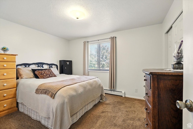 1777 W 4200 N, Smithfield, UT 84335 - bedroom featuring a baseboard radiator, dark colored carpet, and baseboards