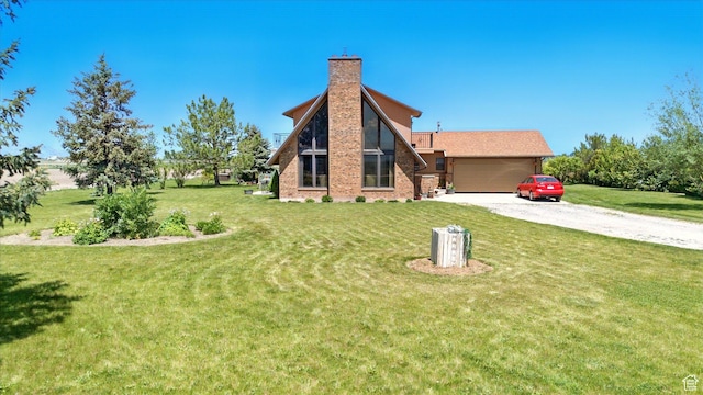 1777 W 4200 N, Smithfield, UT 84335 - view of front of house with driveway, a chimney, a front lawn, and brick siding