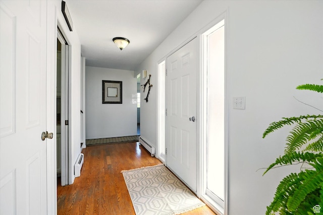 1777 W 4200 N, Smithfield, UT 84335 - hall with a baseboard heating unit and wood finished floors