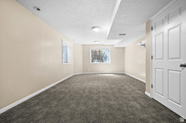 12563 S Bear Castle Cv, Draper, UT 84020 - empty room featuring dark carpet, a textured ceiling, and baseboards