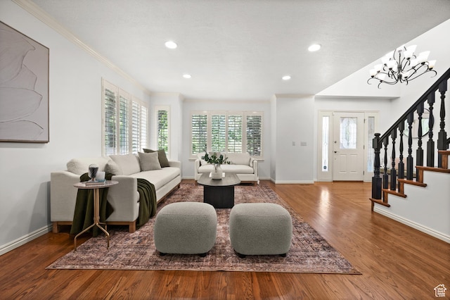 12563 S Bear Castle Cv, Draper, UT 84020 - living room featuring crown molding, wood finished floors, baseboards, recessed lighting, and stairs