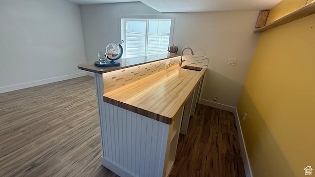 6705 S High Bluff Dr W, West Jordan, UT 84081 - bar area featuring a sink and dark wood-type flooring