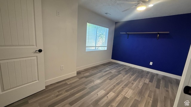 6705 S High Bluff Dr W, West Jordan, UT 84081 - unfurnished bedroom with wood finished floors and ceiling fan