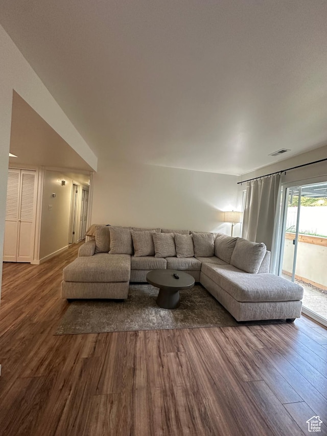 4853 S Woodbridge Dr E Unit 44, Salt Lake City, UT 84117 - living room with dark wood-style floors