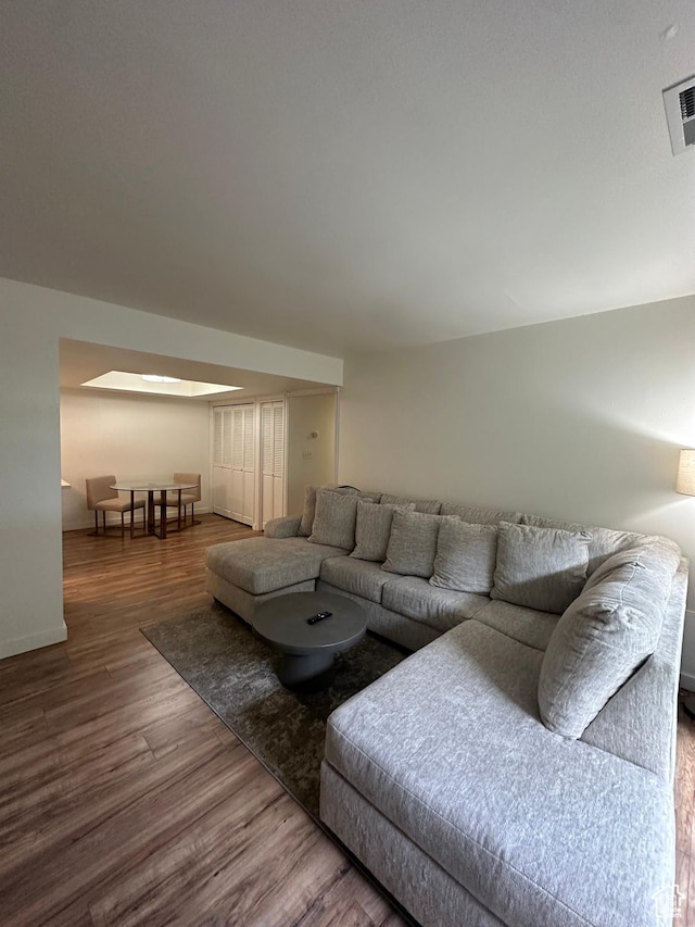 4853 S Woodbridge Dr E Unit 44, Salt Lake City, UT 84117 - living room featuring wood finished floors and baseboards