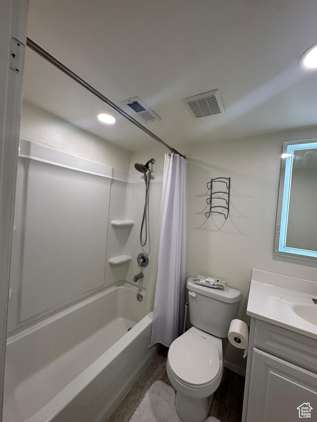 4853 S Woodbridge Dr E Unit 44, Salt Lake City, UT 84117 - bathroom featuring shower / tub combo, toilet, and vanity