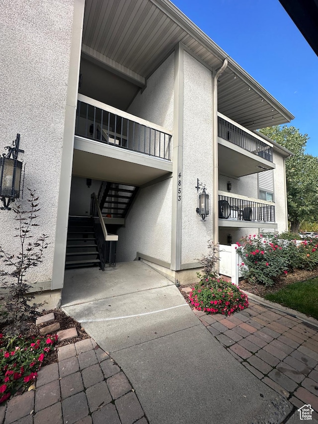 4853 S Woodbridge Dr E Unit 44, Salt Lake City, UT 84117 - view of building exterior featuring stairs